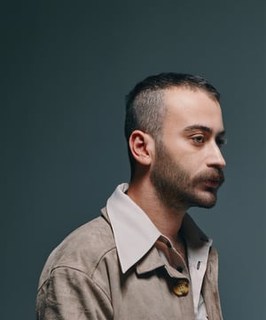This is the Avatar Image for the Kaan Boşnak (Yüzyüzeyken Konuşuruz) AI Voice and Text to Speech Generator